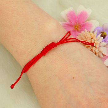 Bransoletka czerwony sznurek - znak nieskończoności tył.jpg